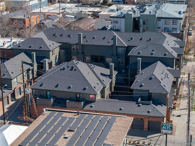 birds eye view of property with a residential view