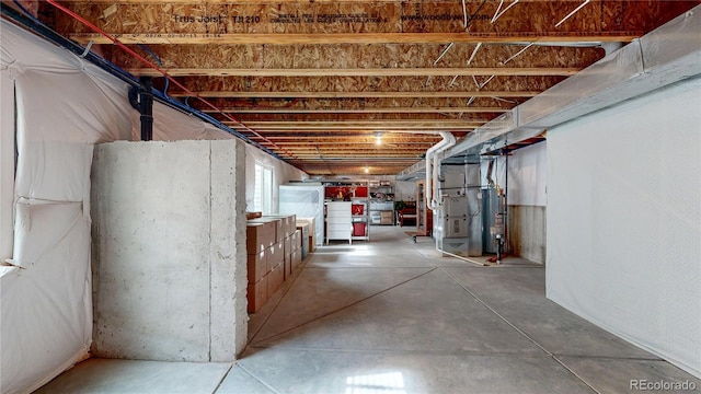 basement featuring heating unit