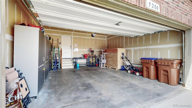 garage featuring a garage door opener