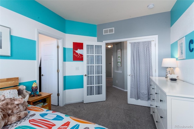 carpeted bedroom featuring french doors and visible vents