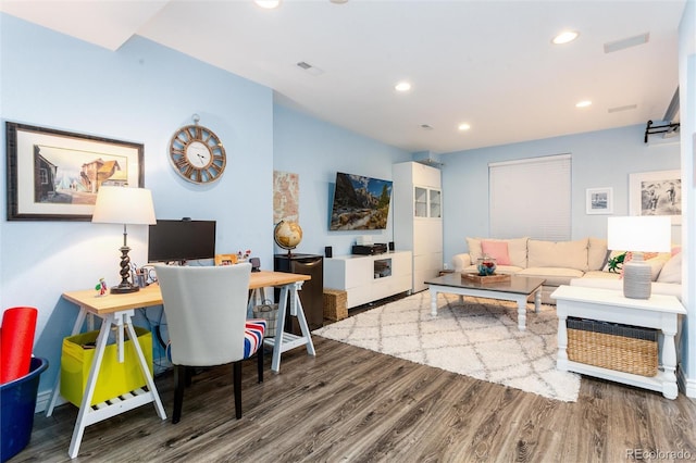 living area featuring wood finished floors, visible vents, and recessed lighting