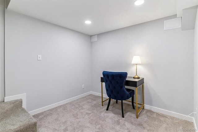 carpeted office space featuring recessed lighting and baseboards