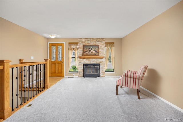 2871 Humboldt Cir, Longmont, CO 80503 - living room with carpet and a stone fireplace