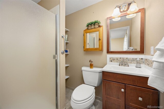 2871 Humboldt Cir, Longmont, CO 80503 - full bathroom with vanity, a shower stall, tasteful backsplash, and tile patterned floors