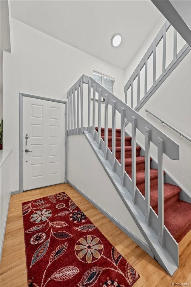 8060 Meadowdale Sq, Niwot, CO 80503 - staircase with wood finished floors