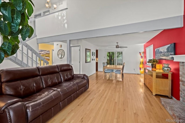 8060 Meadowdale Sq, Niwot, CO 80503 - living area featuring ceiling fan, hardwood / wood-style floors, and stairs