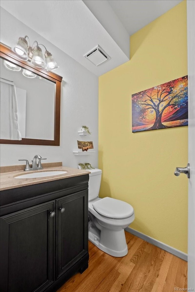 8060 Meadowdale Sq, Niwot, CO 80503 - bathroom with wood finished floors and vanity
