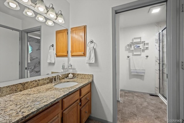 8060 Meadowdale Sq, Niwot, CO 80503 - full bathroom with vanity, a shower stall, and stone finish floors