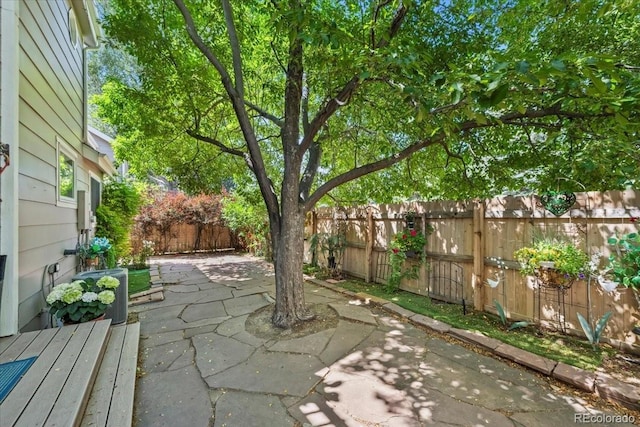8060 Meadowdale Sq, Niwot, CO 80503 - fenced backyard featuring a patio