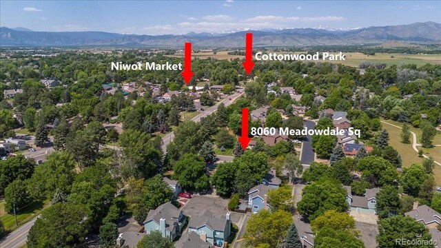 8060 Meadowdale Sq, Niwot, CO 80503 - aerial view of residential area with a mountainous background