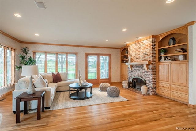 101 Glenmoor Ln, Cherry Hills Village, CO 80113 - living area featuring light wood-type flooring, ornamental molding, a brick fireplace, recessed lighting, and built in features