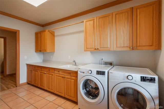 101 Glenmoor Ln, Cherry Hills Village, CO 80113 - laundry area with cabinet space, washer and dryer, crown molding, and light tile patterned floors