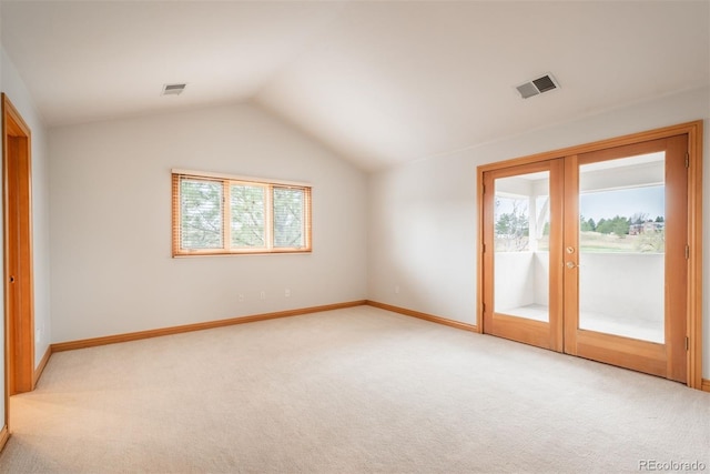 101 Glenmoor Ln, Cherry Hills Village, CO 80113 - unfurnished bedroom with access to exterior, french doors, light colored carpet, and vaulted ceiling