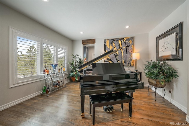 sitting room featuring recessed lighting, baseboards, and wood finished floors