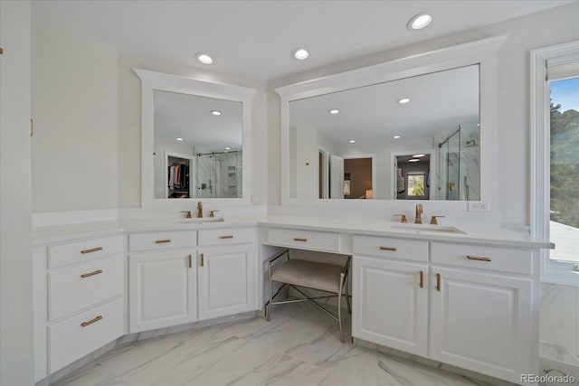 full bathroom with vanity, recessed lighting, marble finish floor, and a marble finish shower