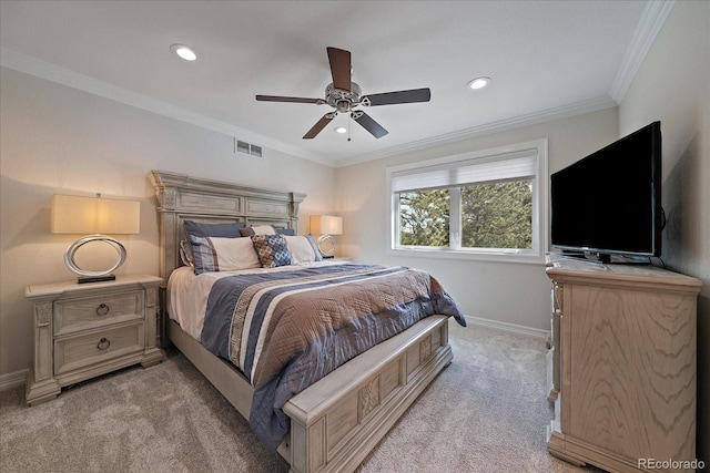 bedroom with visible vents, recessed lighting, crown molding, baseboards, and light colored carpet