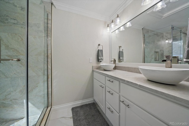 bathroom with crown molding, marble finish floor, a shower stall, and a sink