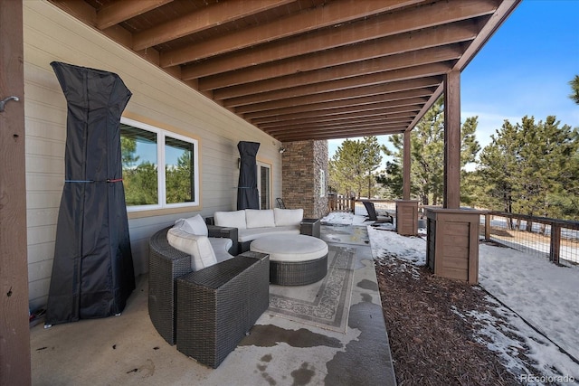 view of patio featuring an outdoor living space and fence