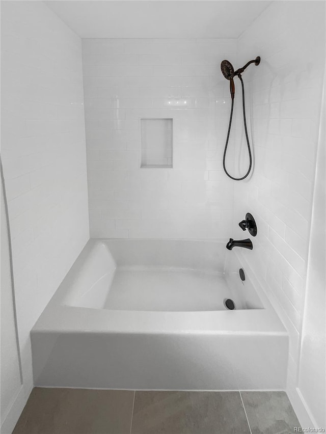 bathroom featuring bathtub / shower combination and tile patterned floors