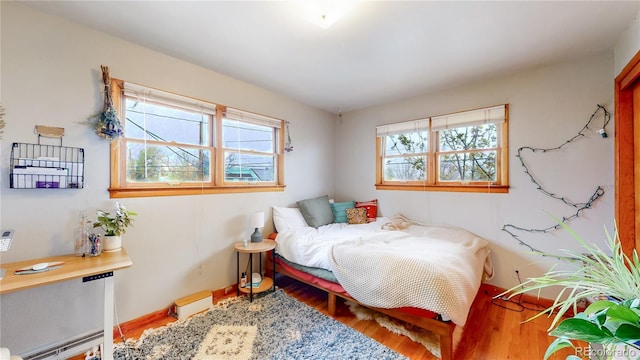 bedroom featuring wood finished floors