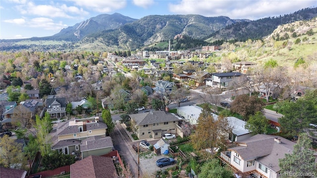 drone / aerial view featuring a mountain view and a residential view