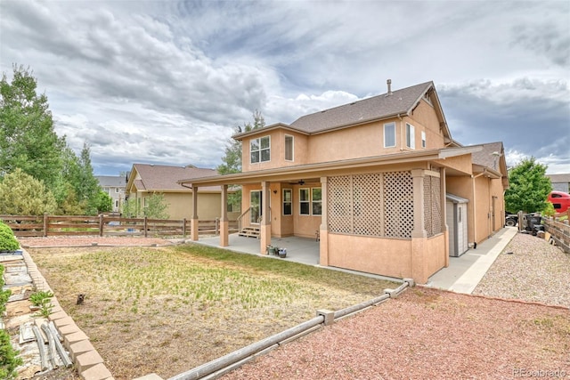 back of property featuring a patio