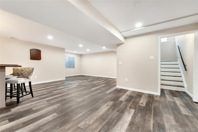 basement featuring dark hardwood / wood-style floors