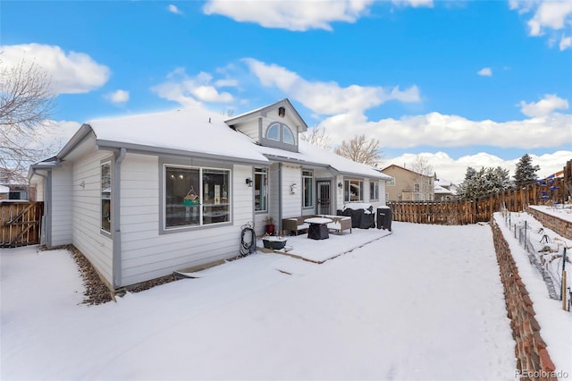 view of snow covered property