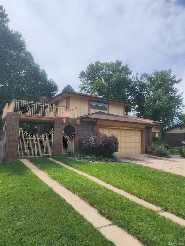 view of front of home featuring a garage and a front lawn