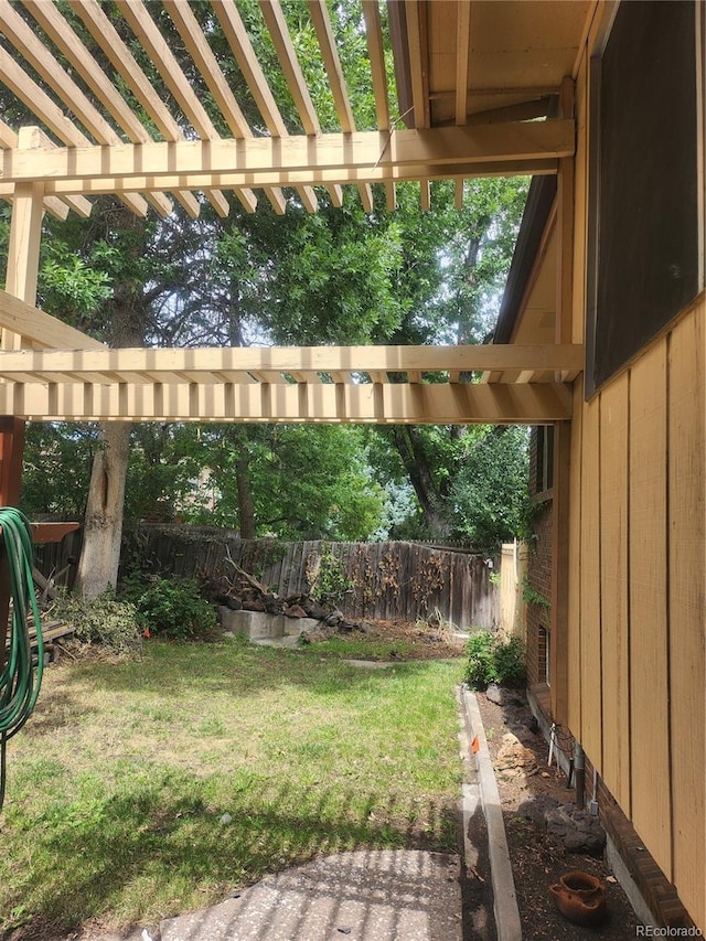 view of yard with a pergola