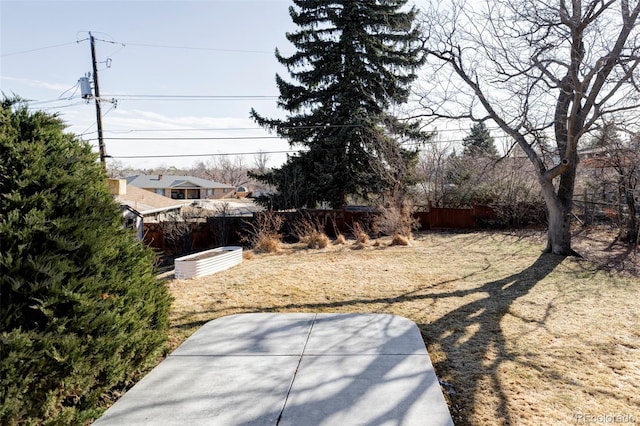 view of yard featuring a patio area and fence