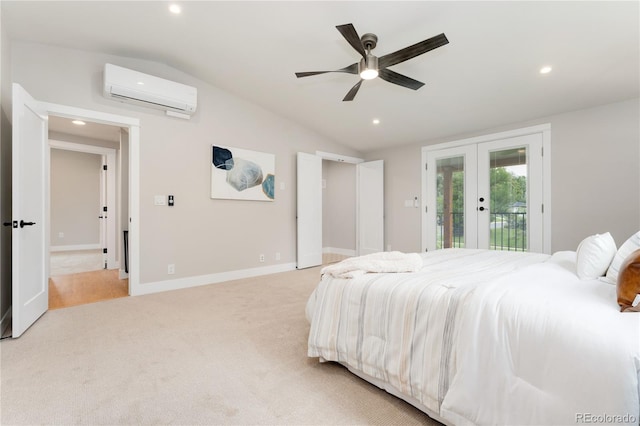 carpeted bedroom with ceiling fan, french doors, a wall mounted air conditioner, vaulted ceiling, and access to outside