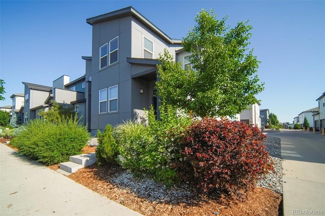 16069 E Elk Dr, Denver, CO 80239 - view of home's exterior with stucco siding and a residential view