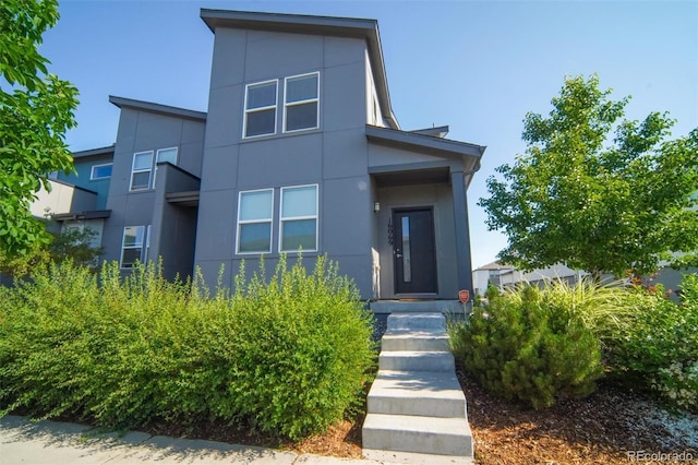16069 E Elk Dr, Denver, CO 80239 - contemporary house with stucco siding