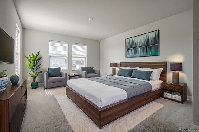 16069 E Elk Dr, Denver, CO 80239 - bedroom with light colored carpet and multiple windows