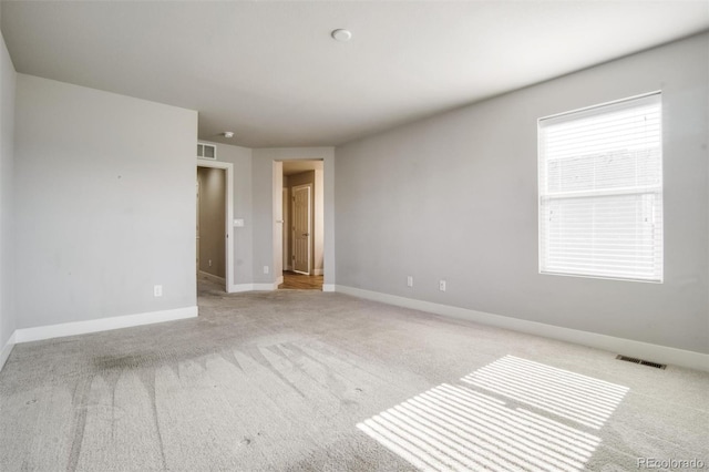 16069 E Elk Dr, Denver, CO 80239 - carpeted empty room with baseboards