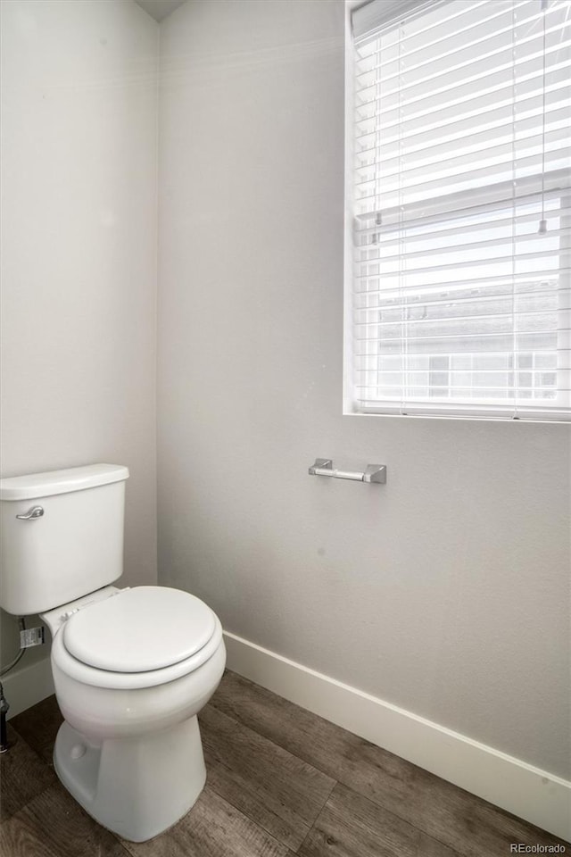 16069 E Elk Dr, Denver, CO 80239 - bathroom featuring healthy amount of natural light and wood finished floors