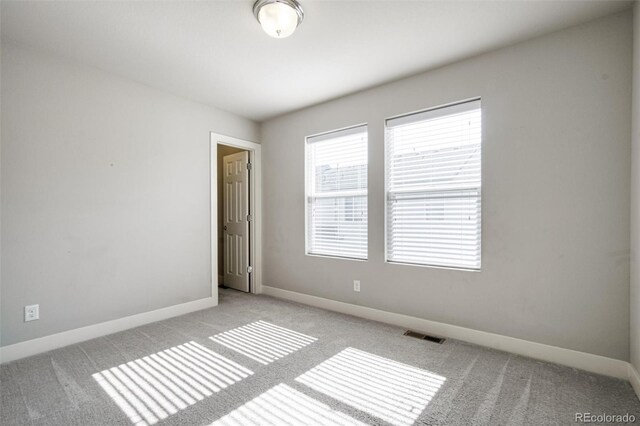 16069 E Elk Dr, Denver, CO 80239 - unfurnished room with light carpet