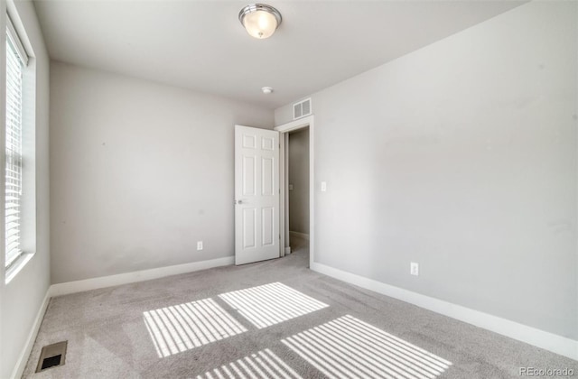 16069 E Elk Dr, Denver, CO 80239 - unfurnished room featuring light colored carpet and plenty of natural light