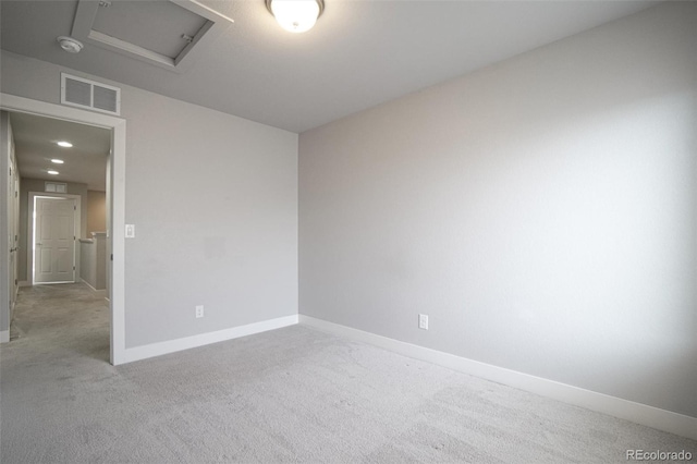 16069 E Elk Dr, Denver, CO 80239 - unfurnished room with attic access, a smoke detector, and carpet floors