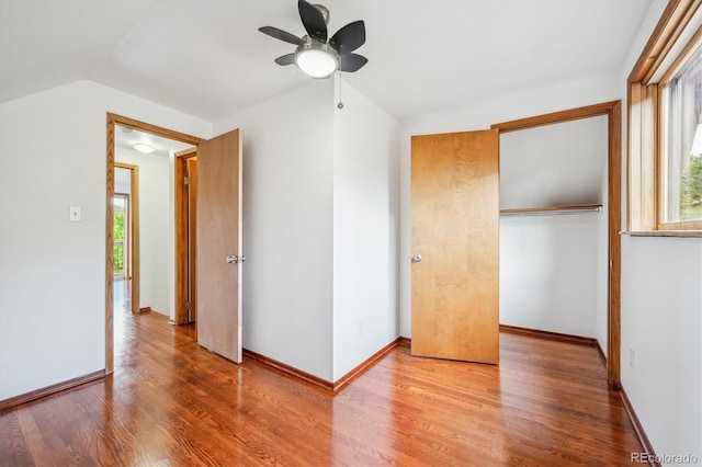 429 Overlook Dr, Bailey, CO 80421 - unfurnished bedroom with lofted ceiling, wood finished floors, and a ceiling fan
