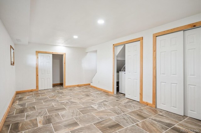 429 Overlook Dr, Bailey, CO 80421 - unfurnished bedroom featuring multiple closets, recessed lighting, and washer / clothes dryer