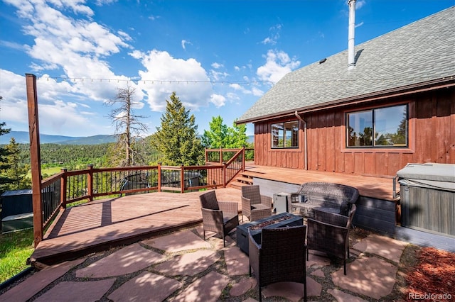 429 Overlook Dr, Bailey, CO 80421 - view of patio / terrace featuring a hot tub, a wooden deck, and a fire pit