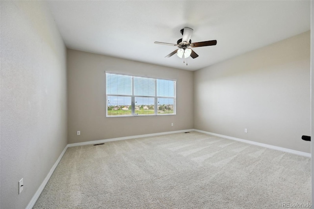 10402 Capital Peak Way, Peyton, CO 80831 - unfurnished room with light colored carpet, ceiling fan, and baseboards