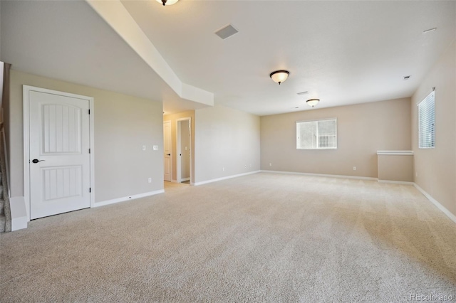 10402 Capital Peak Way, Peyton, CO 80831 - empty room with light colored carpet, healthy amount of natural light, and baseboards