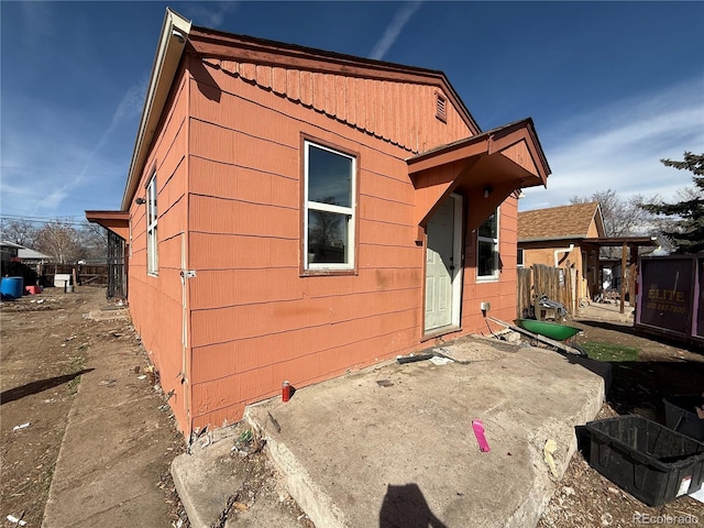 exterior space featuring a patio and fence