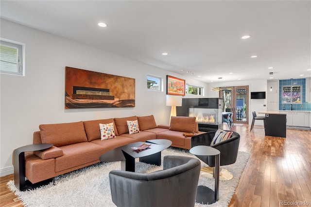 2334 Lowell Blvd, Denver, CO 80211 - living area featuring light wood-type flooring and recessed lighting