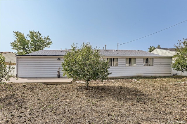 back of property featuring a patio area