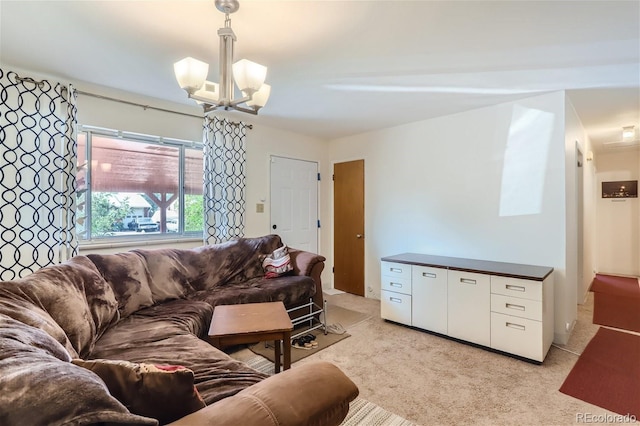 living room with light carpet and an inviting chandelier