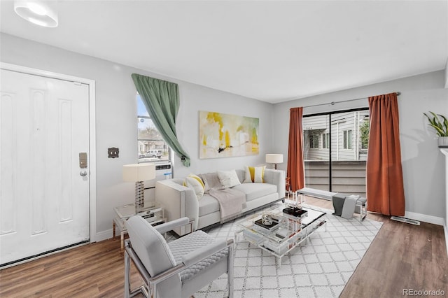 17004 E Tennessee Dr Unit 103, Aurora, CO 80017 - living area featuring wood finished floors and baseboards